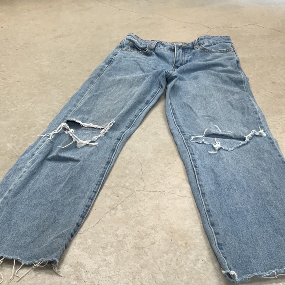 Distressed Blue Jeans